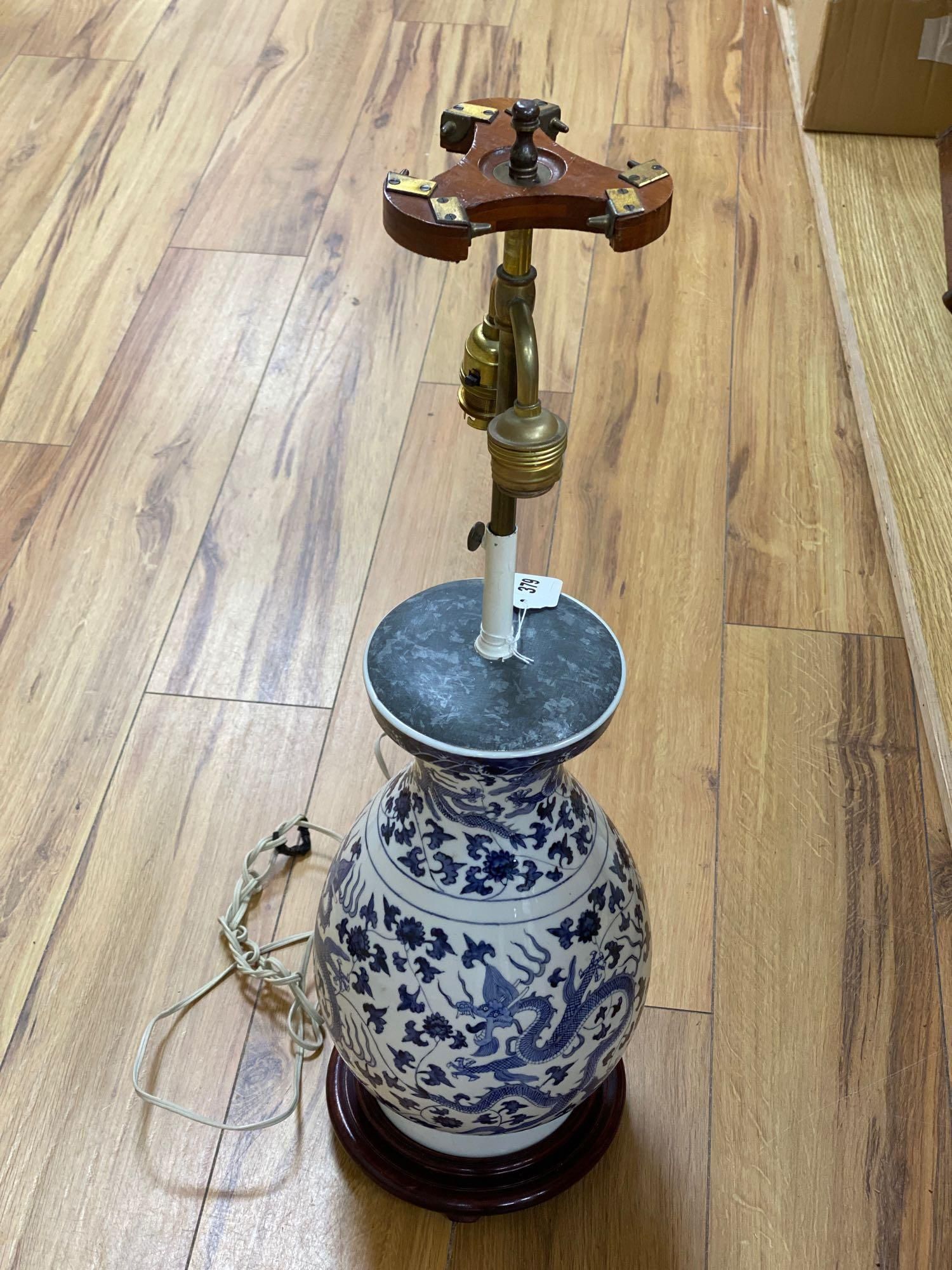 A modern Chinese blue and white dragon vase / table lamp